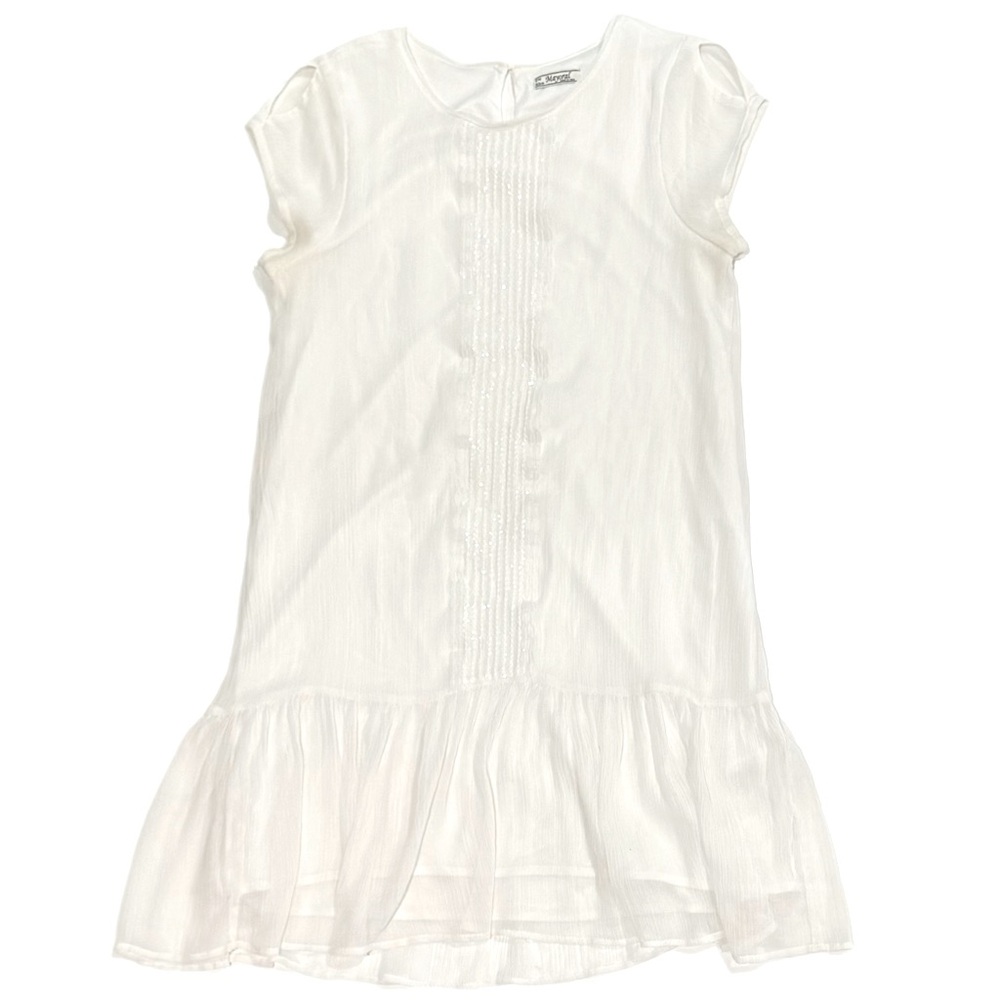White dress with sequins down the middle.